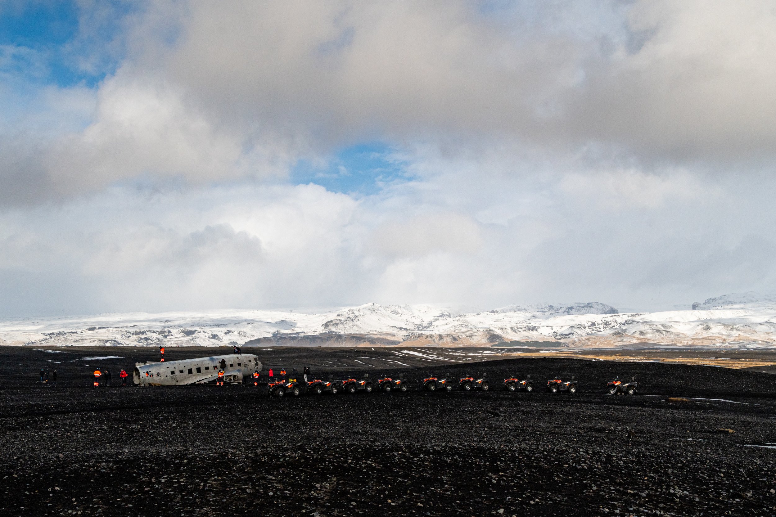 ATV; DC plane; Iceland; Vík; Vík í Mýrdal; climbing; clouds; landscape; light; nature; people; plane; sky; snow; stones; travel; winter; wreck; ,  Mykhailo