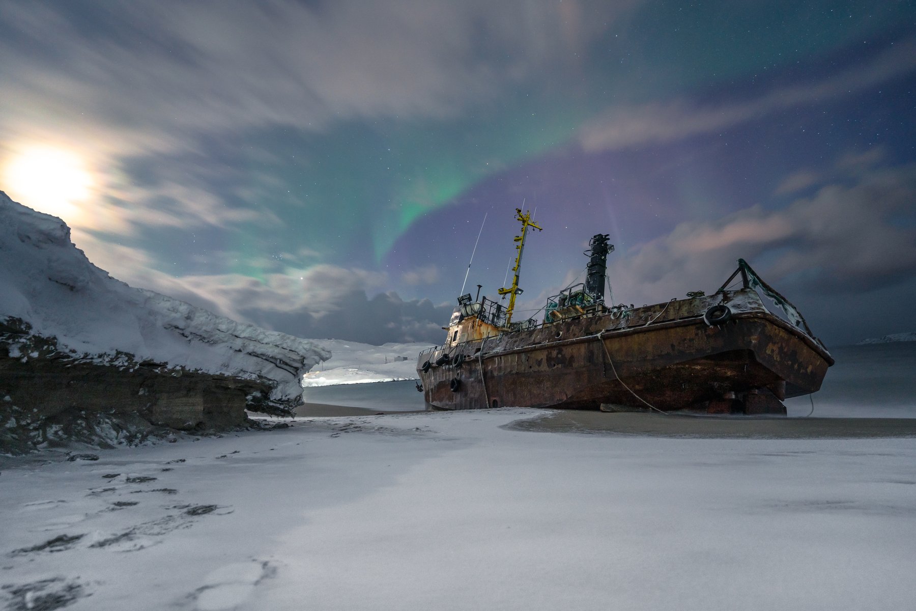 tundra; transportation; graveyard of ships; cloudy sky; tourism; beautiful; russian; outdoor; scenery; peninsula; barents; ocean; background; arctic circle; arctic ocean; bay; kola; northern; fishing boat; aurora; russia; ship; landscape; kola peninsula; , Dmitry Leonov