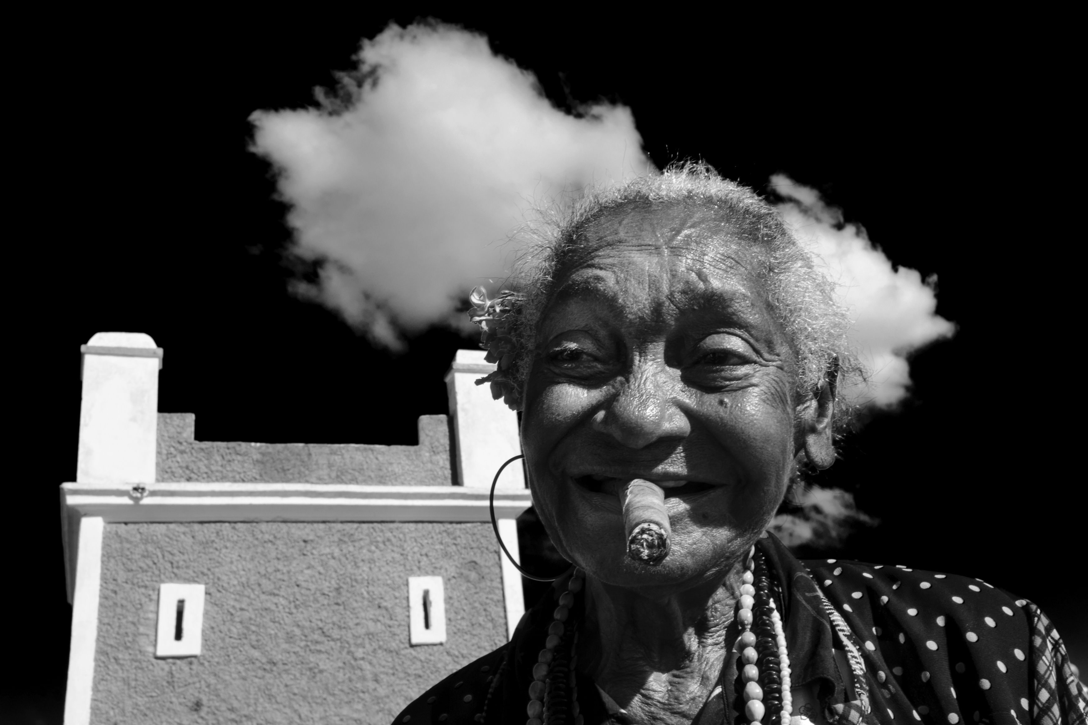 Cuba,  black and white,  smoking, smoke, clouds, street, woman , Orna Naor
