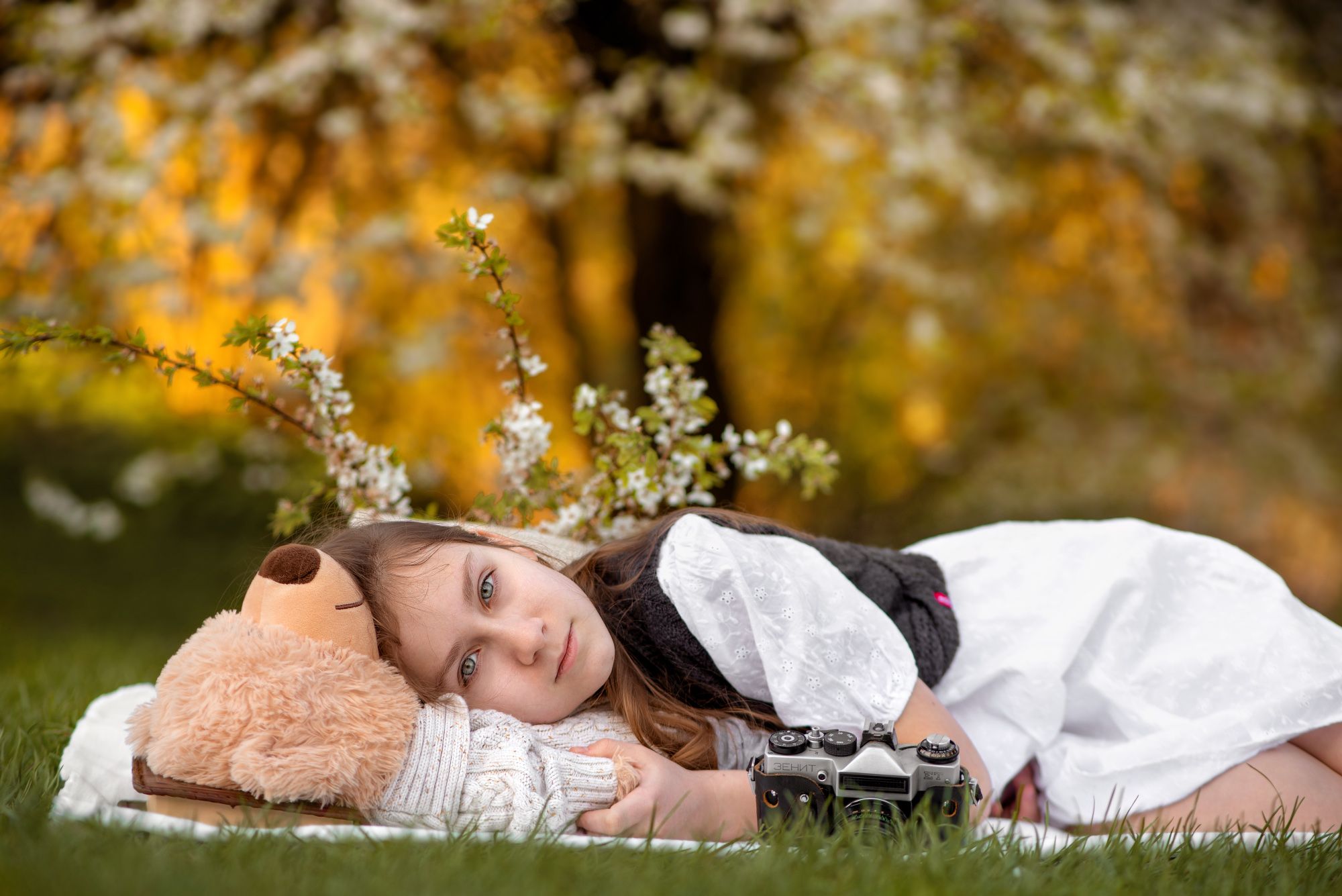 little girl teddy bear blooming tree sunset vintage camera orange greenery, Aliaksandra Klimchuk