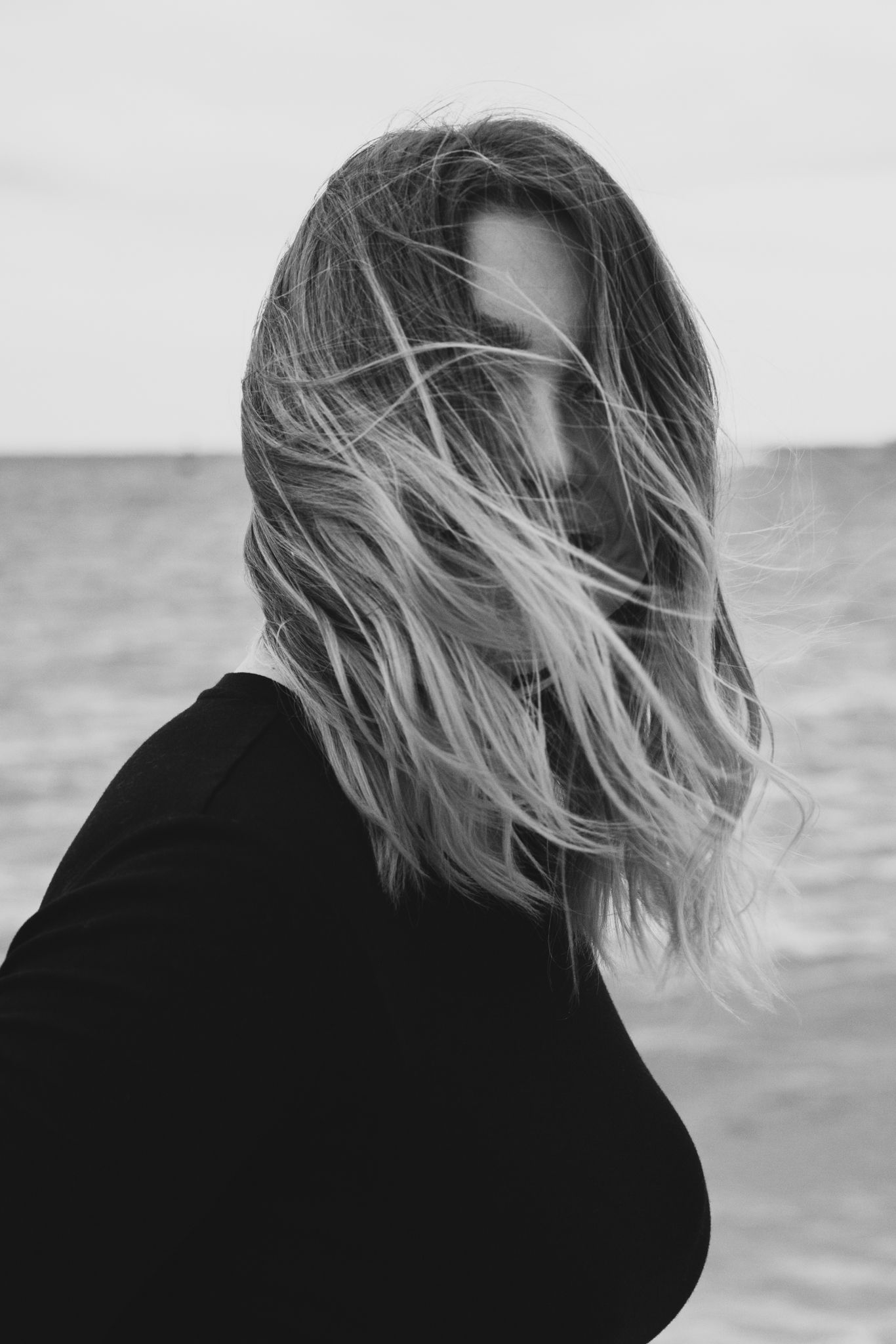 sea, hair, long, windy, black and white, face, hidden, smile, Druz Denys