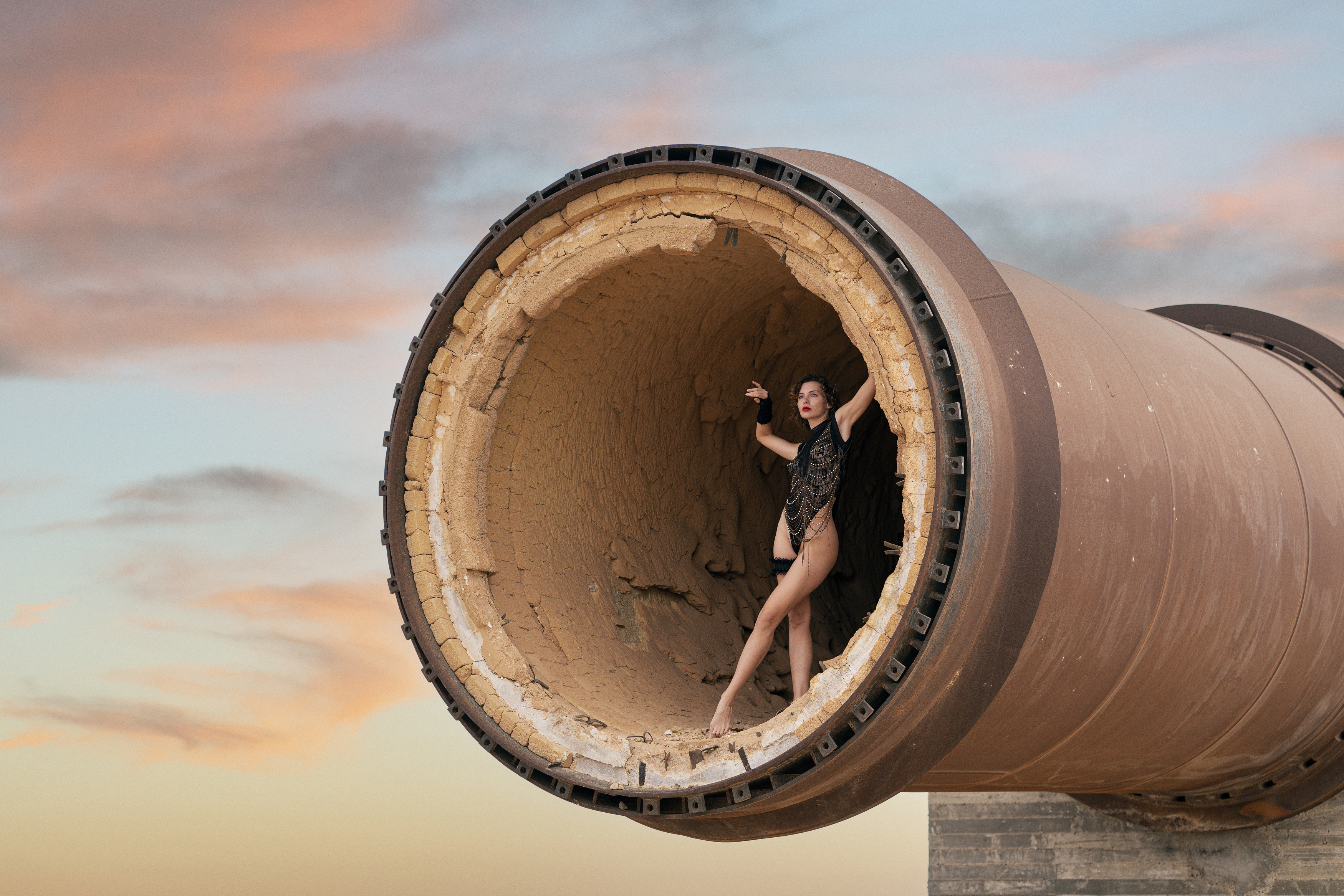 abandoned building, beautiful woman, clouds, dreaminess, elegance, female, grace, individuality, lifestyles, lingerie, looking, makhtesh ramon, one person, outdoors, pipe, sensuality, side view, skies, standing, sunrise, underwear, young women, Alex Tsarfin