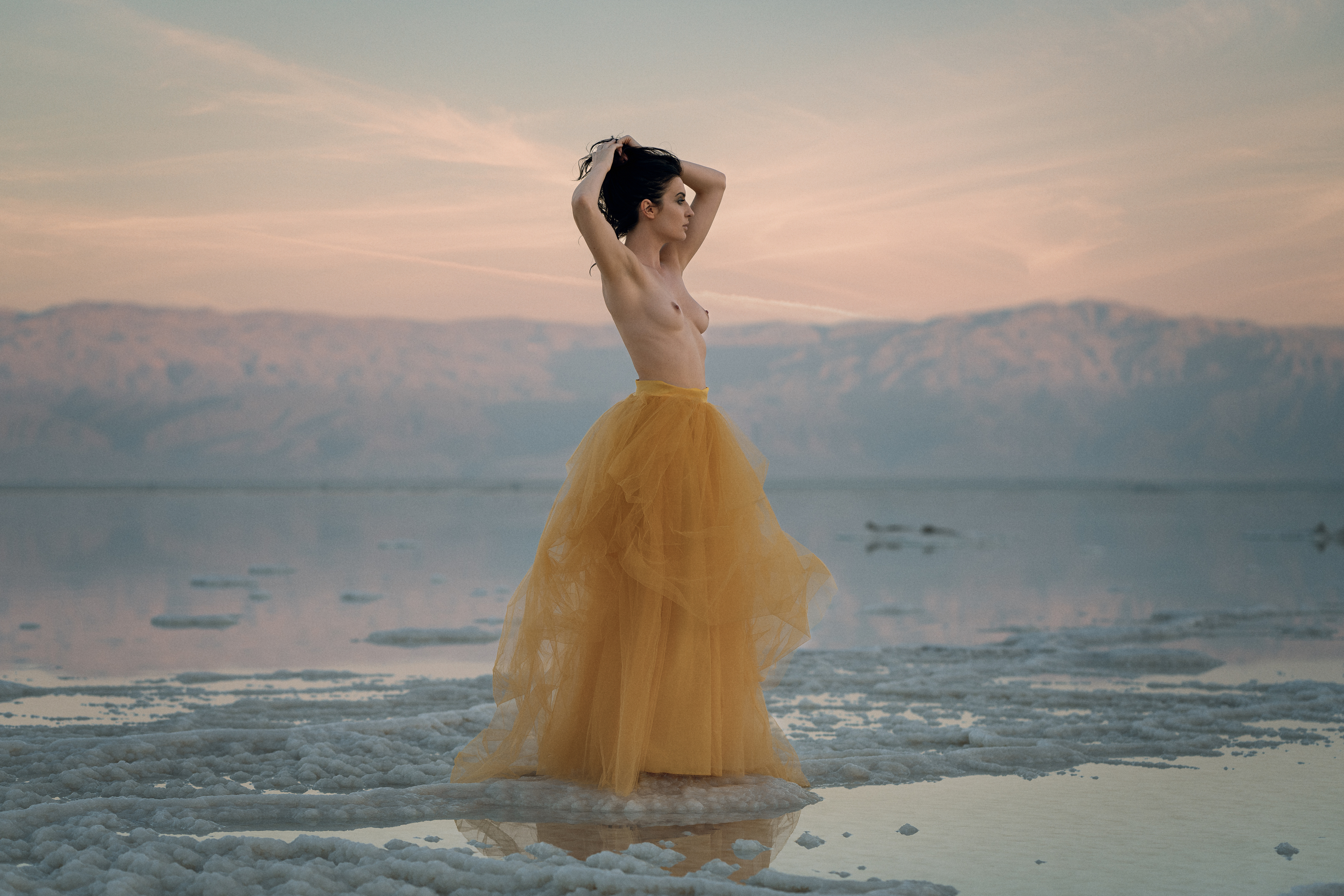 ball gown, beautiful woman, beauty, dead sea, desert, dreaminess, elegance, femininity, golden hour, grace, looking, mountains, nude, one person, outdoors, reflections, salt, seductive women, sensuality, side view, sky, standing, sunset, water, woman, Alex Tsarfin