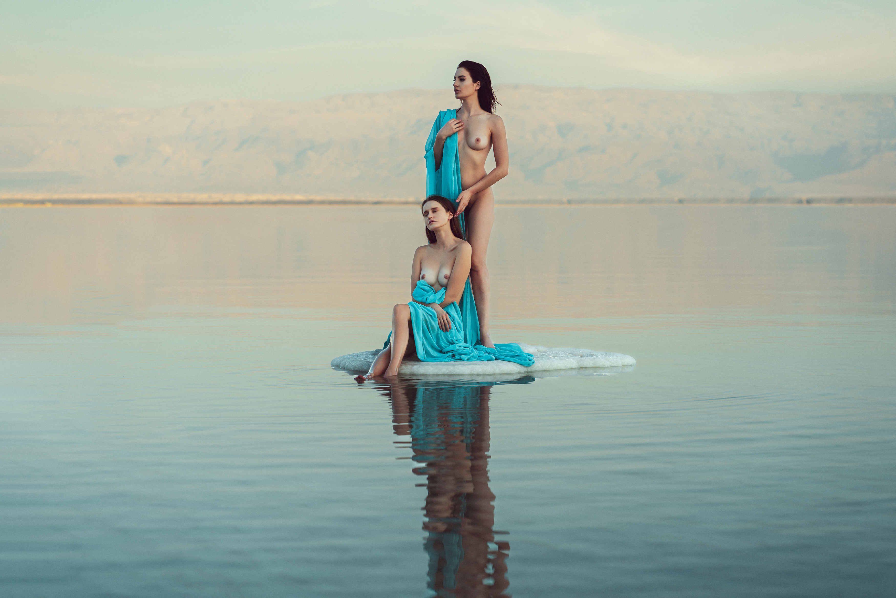 beauty, dead sea, dreaminess, elegance, enjoyment, femininity, front view, grace, lifestyles, looking, mountains, nude, outdoors, pair, pose, reflections, relaxation, salt, seductive women, sensuality, sitting, sky, standing, two, veil, water, young women, Alex Tsarfin