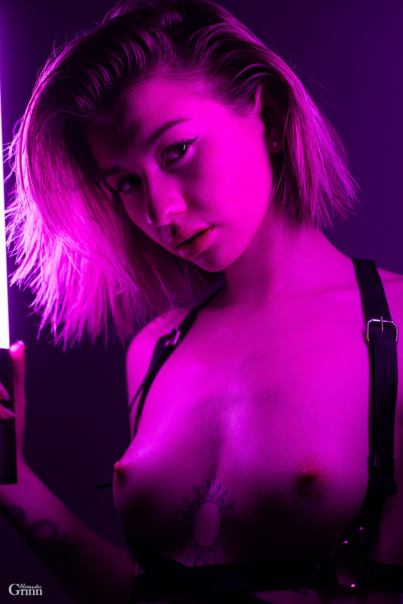 NeonNude, BrunetteBeauty, ToplessArt, FitFigure, SmallBreasts, NeonLighting, SensualPose, ArtisticNude, StunningBrunette, GlamourNude, CaptivatingEyes, NeonGlow, CurvyAndFit, NudeArt, GlamourPhotography, BeautifulBrunette, SensualArt, GlamourNeon, NeonVib, Grinn Alexander