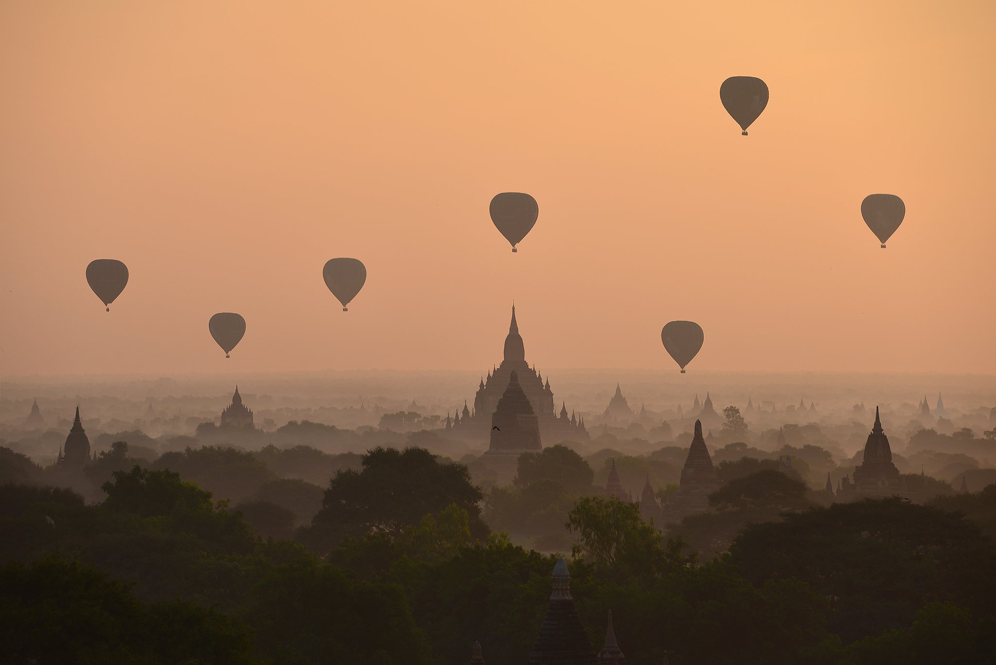 Weather Architecture Bagan Buddhism Built Structure Color Image Flying Fog Horizontal Hot Air Balloon Mid-Air Mode of Transport Mountain Myanmar Nature No People Outdoors Pagoda Photography Silhouette Sky Sunrise - Dawn Temple - Building Transportation Tr, sarawut intarob