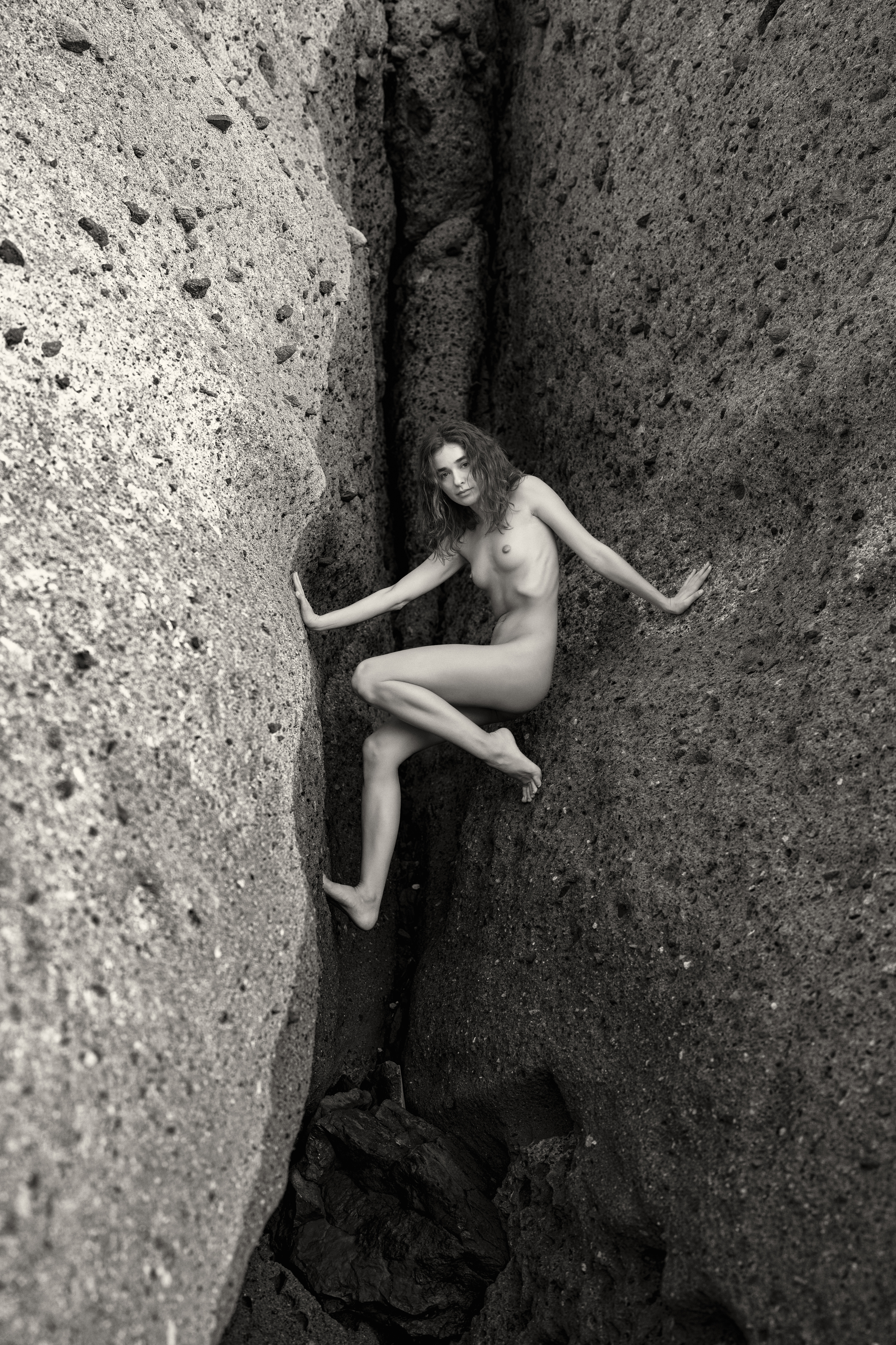 artnude, beautiful woman, beauty in nature, black lava, cliff, female, femininity, grace, individuality, lifestyles, looking at camera, monochrome, naked, nude, one person, outdoors, pose, rocks, seductive women, sensuality, side view, young woman, Alex Tsarfin