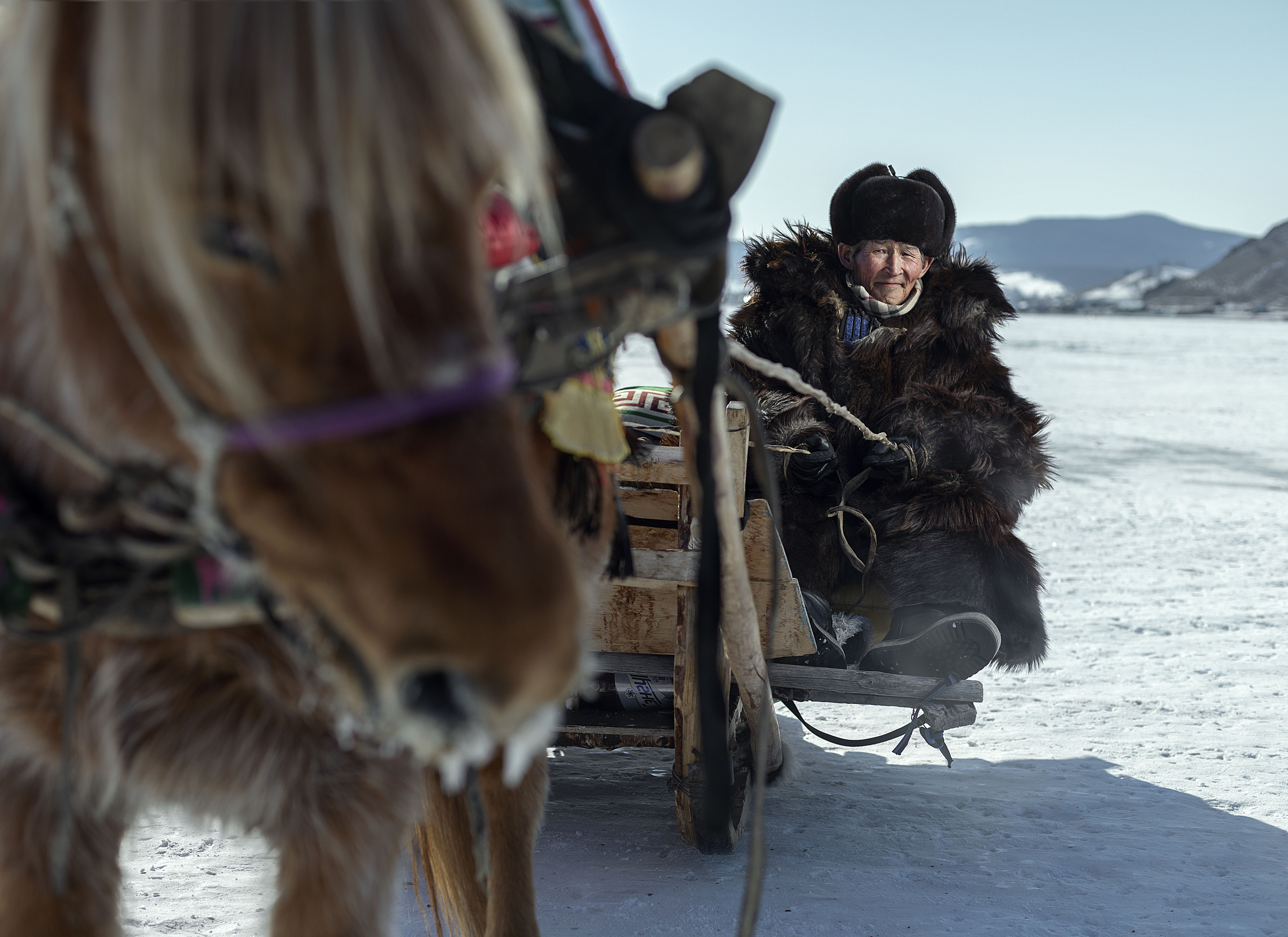 mongolian noamdic winter ice festival khuvsgul lake horse man portrait, ganzorig miimaa
