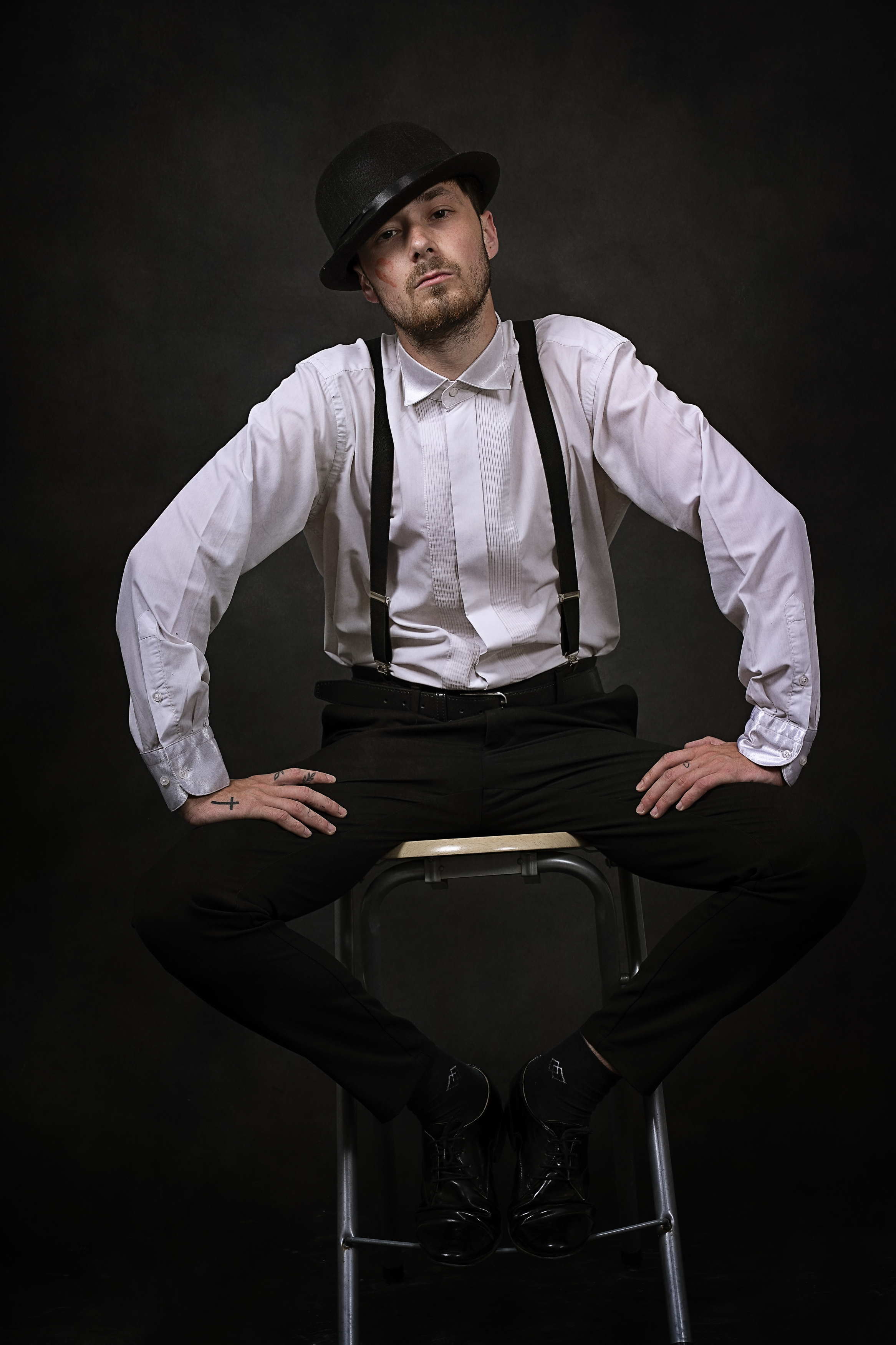 portrait, man, hat, suspenders, vintage style, theatrical, moody lighting, retro fashion, expression, character study          ask chatgpt, Bogdan Negoita