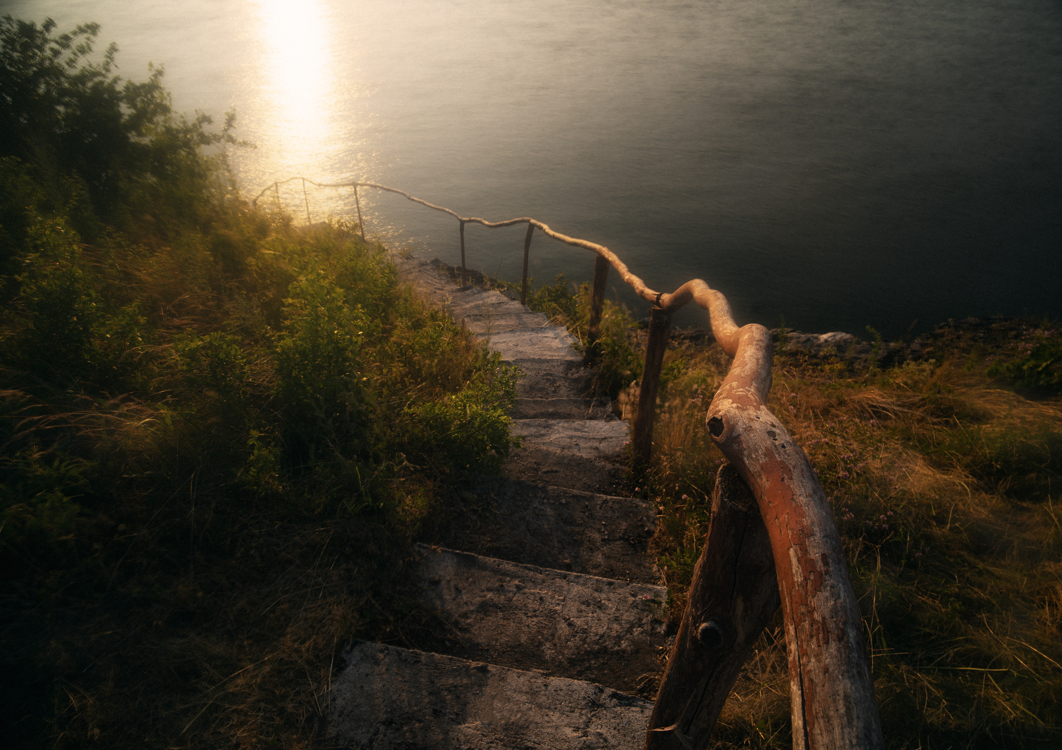 landscape, golden hour, leading lines, handrail, steps, coastline, minimal, cinematic, moody landscape, nature, water, evening, texture, filmic, solitude, path, stairs, wood, reflection, outdoor, Oleg Suhenсo
