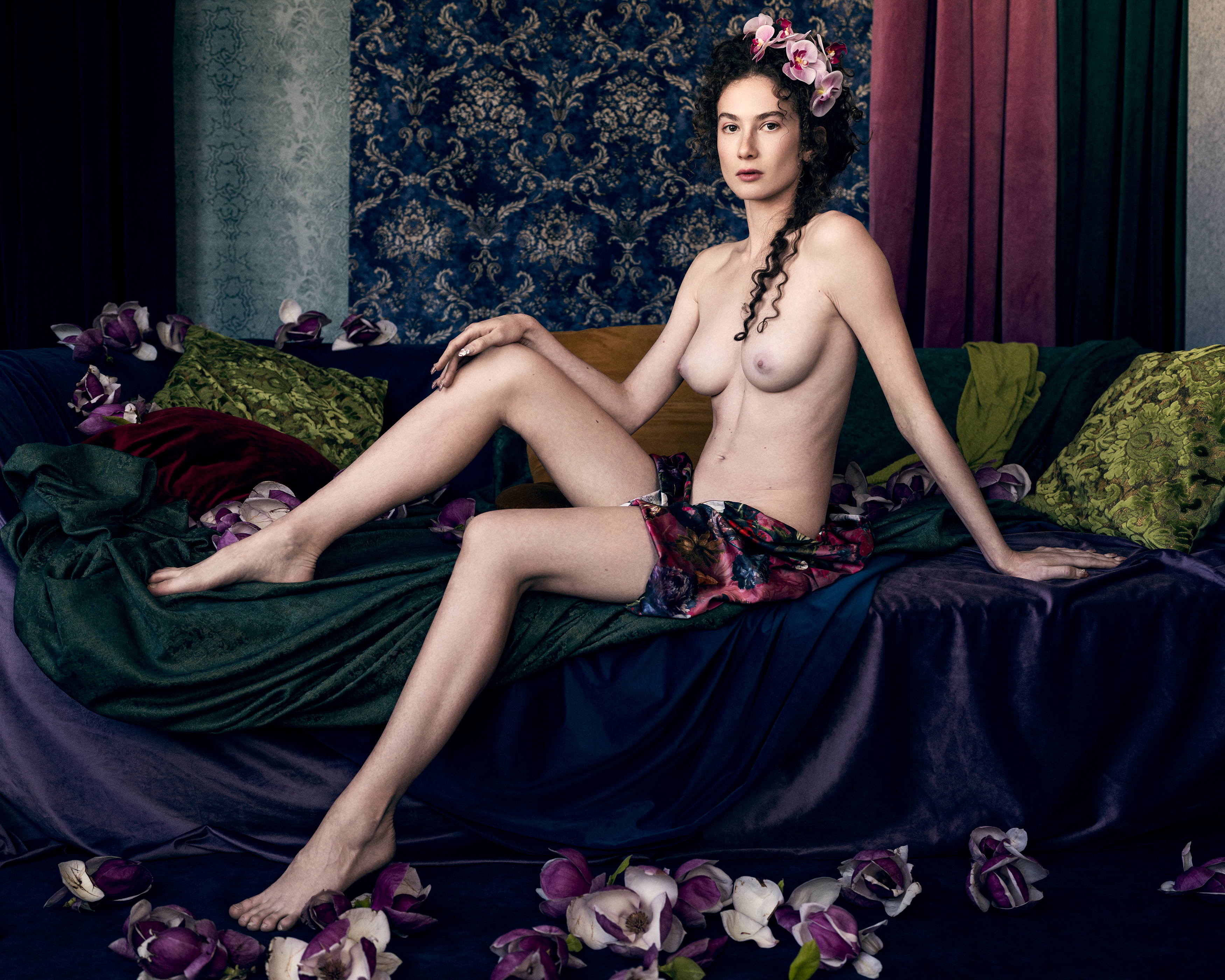 artistic nude, classical nude, colorful fabric, dreamlike atmosphere, elegant pose, exotic flowers, goddess imagery, intimate portrait, opulent setting, painterly nude, poetic sensuality, renaissance style, sensual elegance, velvet drapery, woman form, Alex Tsarfin