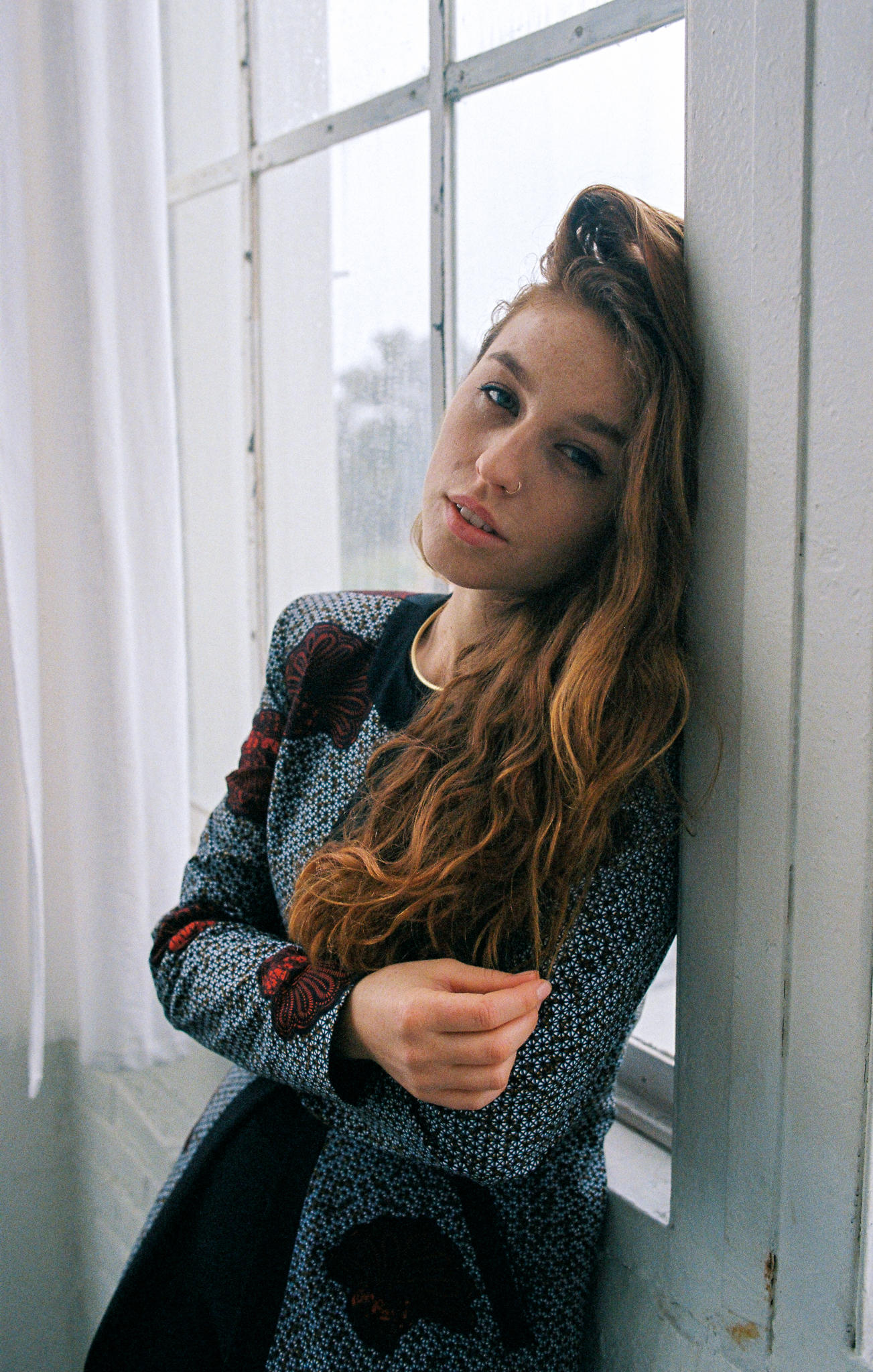 window, light, natural, lighting, film, analog, canon, ae-1, fujifilm, superia, 400, color, negative, 35mm, grain, cozy, sweater, knitwear, thoughtful, contemplative, intimate, lifestyle, casual, authentic, soft, warm, tones, kisa, hues, model, Erik Rozman