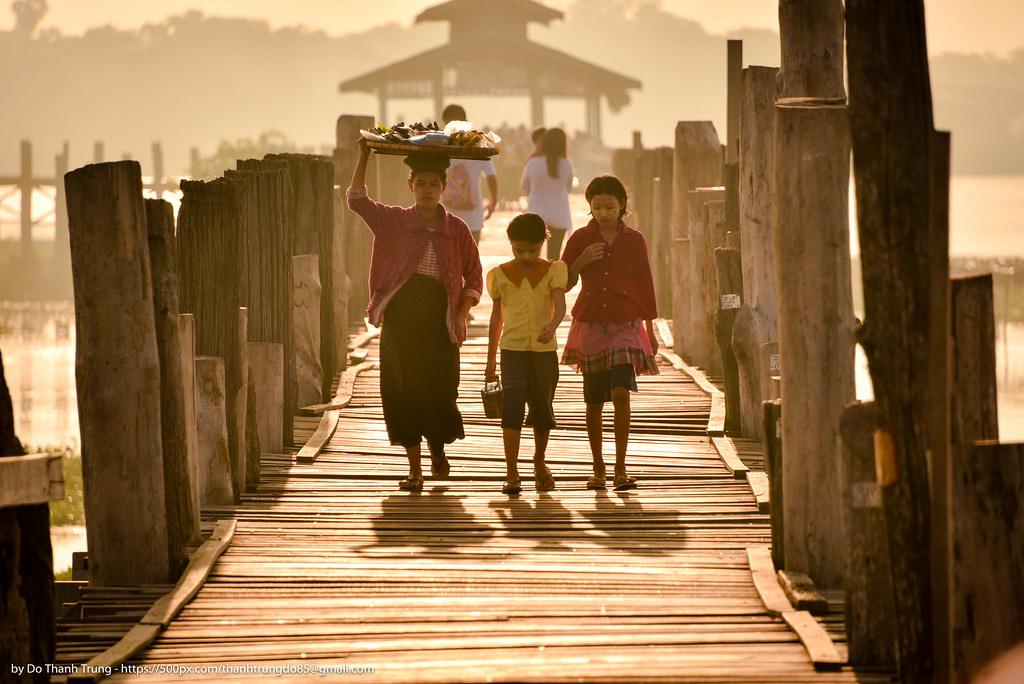 lnle Myanmar woman wooden bridge , Do Trung