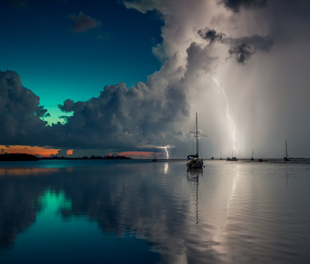 Blue, Boats, Clouds, Lightning, Ocean, Rain, Red, Reflection, Sky, Storm, Summer, Sunset, Water, Alexandr Popovski