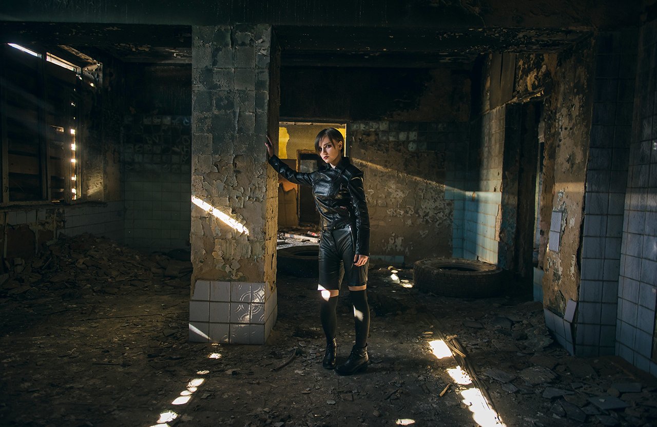 The abandoned building sunlight, girl, beauty,short hair, tiled walls, after the war,rays,leather jacket,Apocalypse, vadim