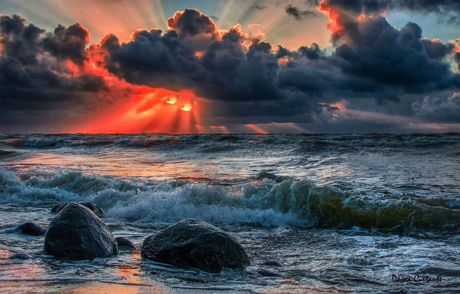 sunset,seascape,clouds,sun rays,stones, Daiva Cirtautė
