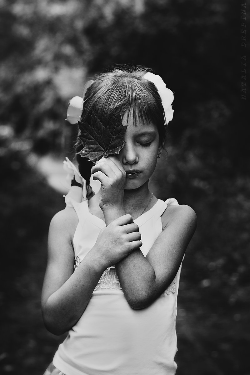 autumn maple leaf, black and white, forest, girl, child, serious, feeling, touching, Natalia Drepina