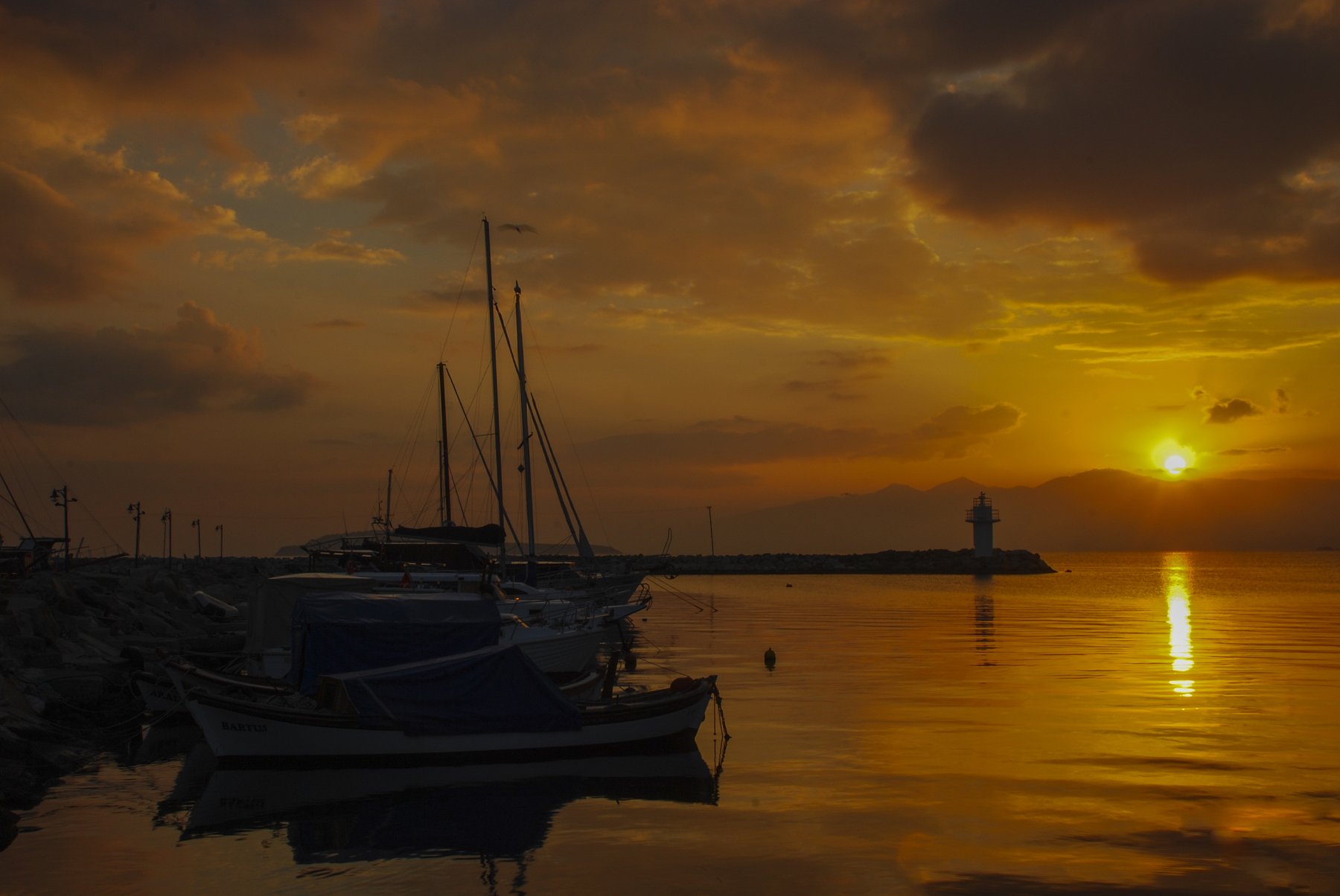 sunrise,sunset,yellow,sea,light house,sun,sky, mehmet enver karanfil