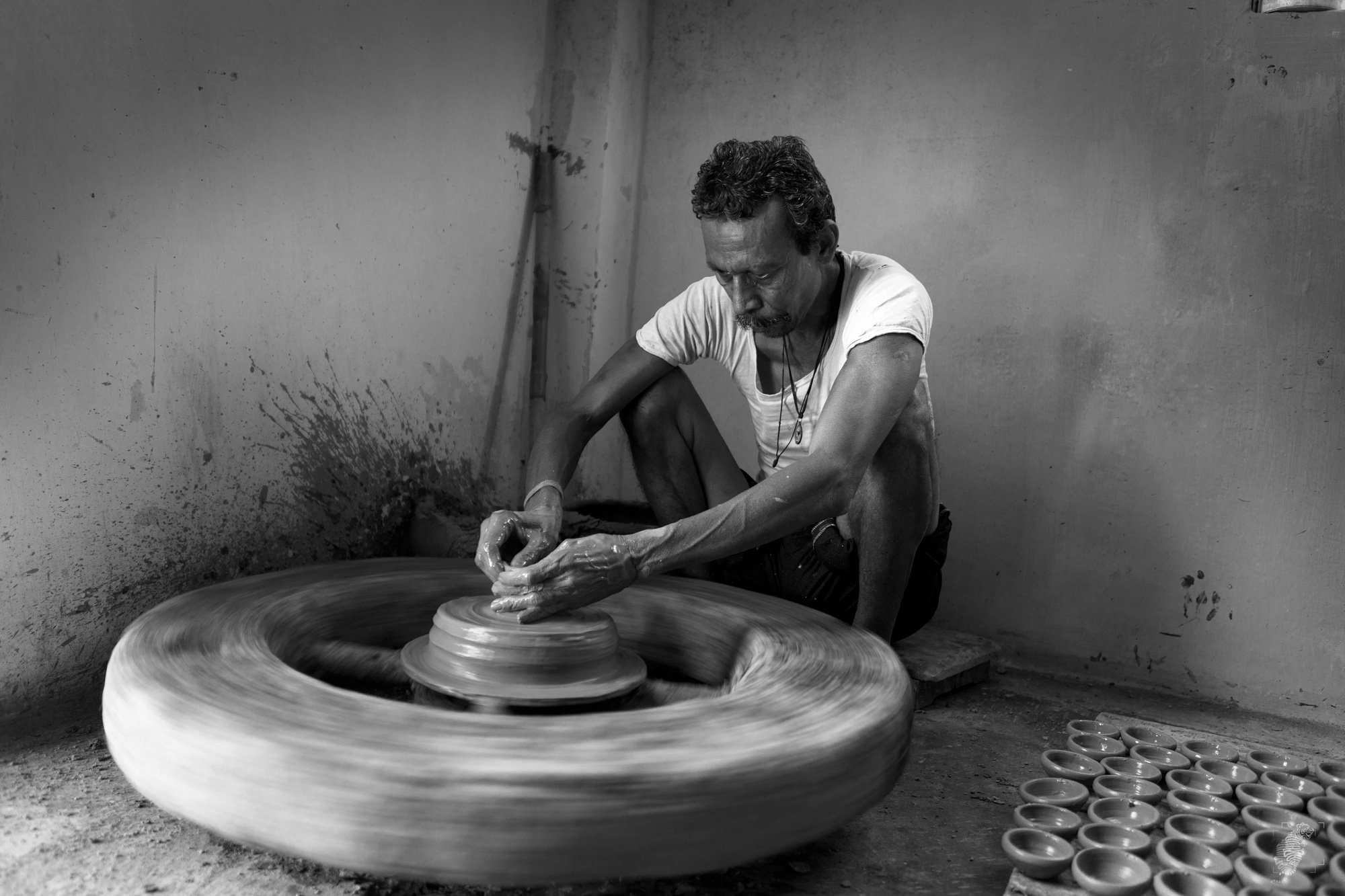 #candid #monochrome #bnw #men at work #potter, Abhijit D
