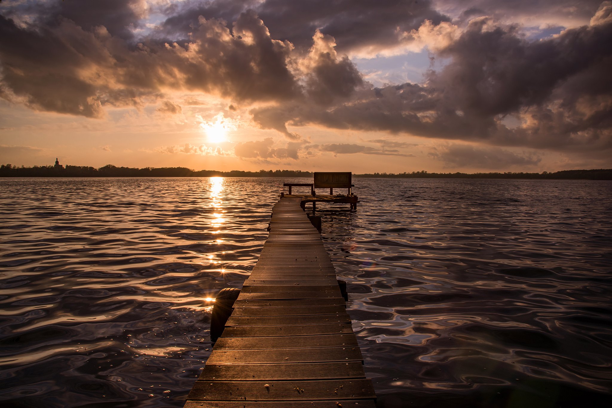 sunset on the lake water mirror sunlight footbridge wood path poland dranikowski sun sky clouds, Radoslaw Dranikowski
