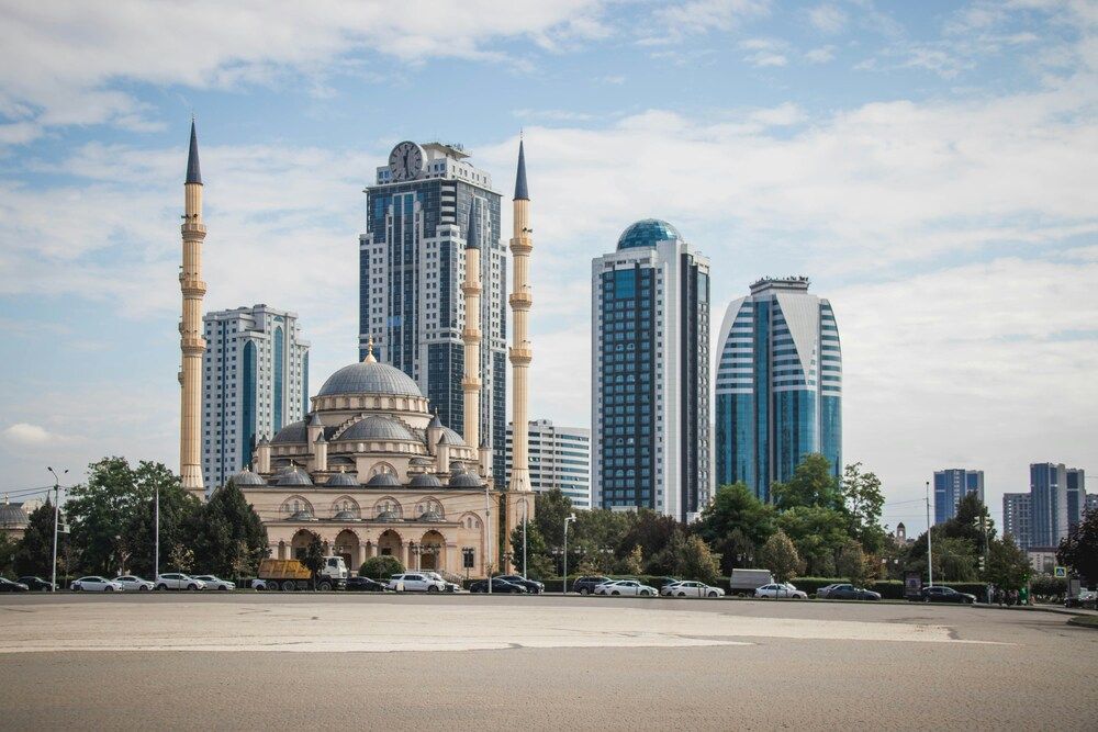 Города