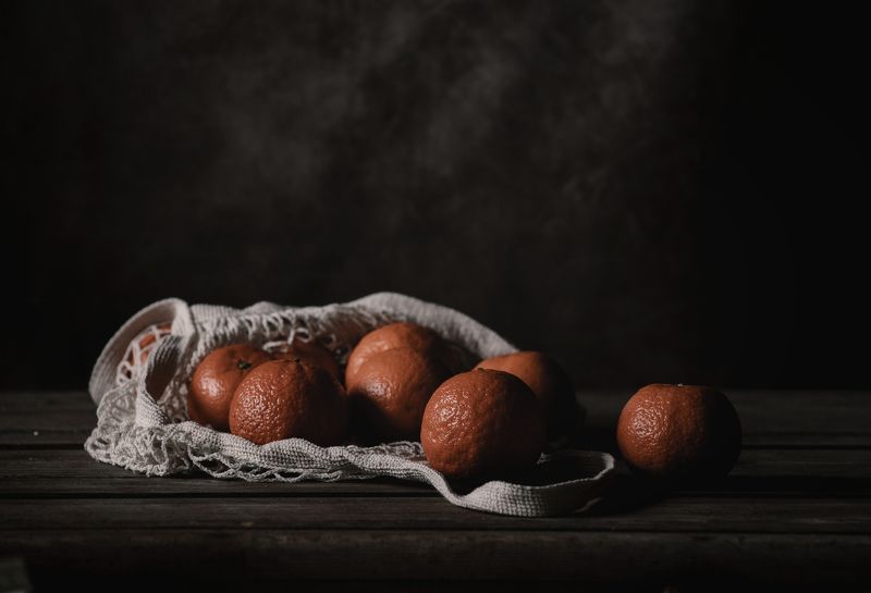 Мандарины в авоськеphoto preview