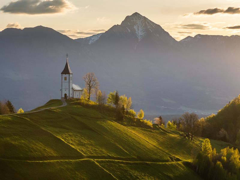 slovenia,church,mountain,alps,julian alps,sunrise,sun,grass,spring Slovenian fairytalephoto preview