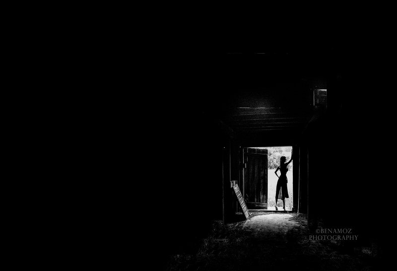 Black and white, woman In the doorwayphoto preview